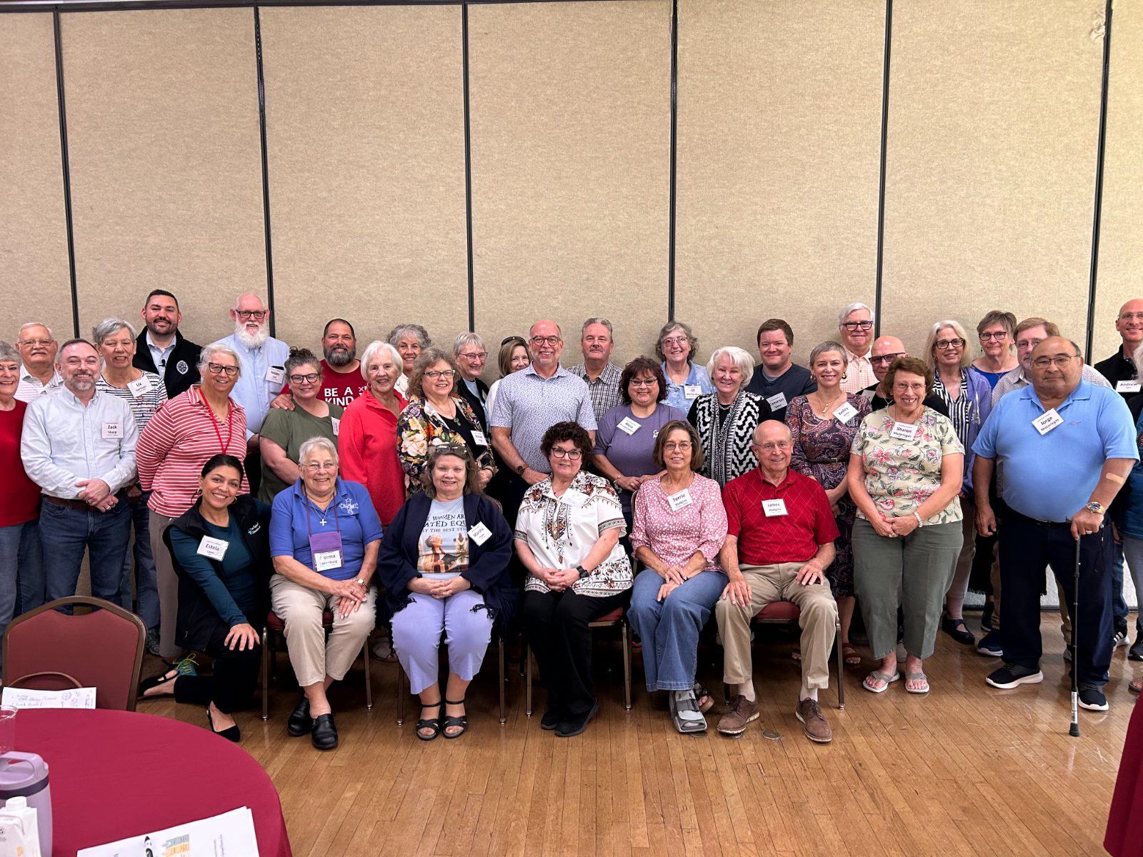 Small Church Network participants gather for a group photo at Camp Allen